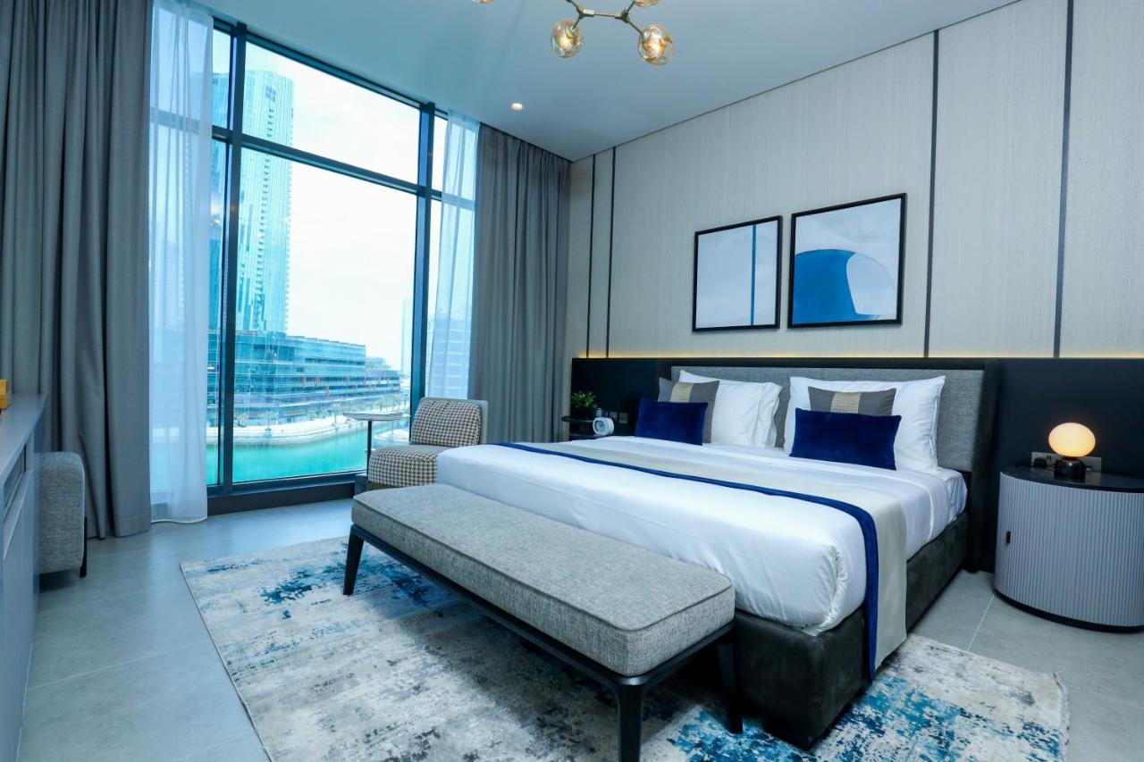 Hotel Charthouse Bahrain Al Manamah Esterno foto A bedroom at the Address Downtown Hotel