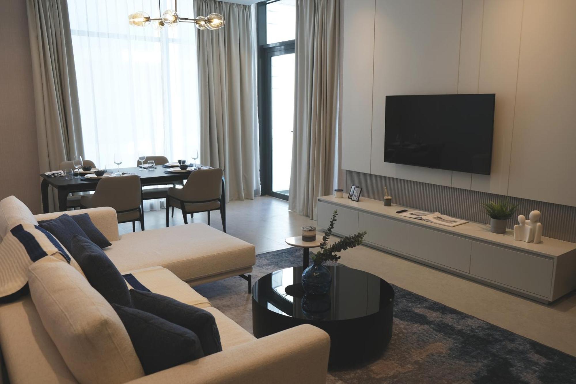 Hotel Charthouse Bahrain Al Manamah Esterno foto A living room in a condominium
