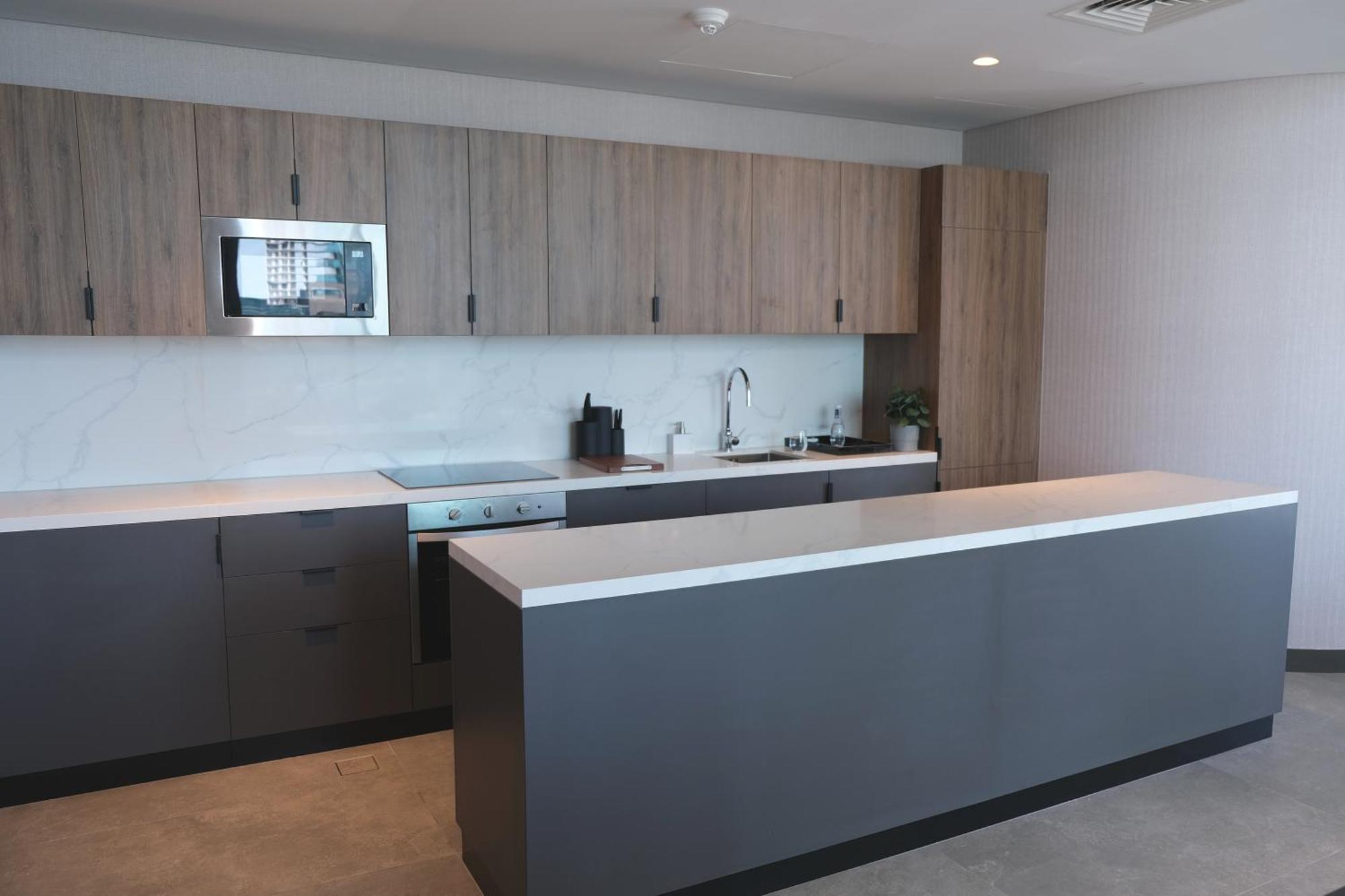 Hotel Charthouse Bahrain Al Manamah Esterno foto A kitchen in a typical apartment